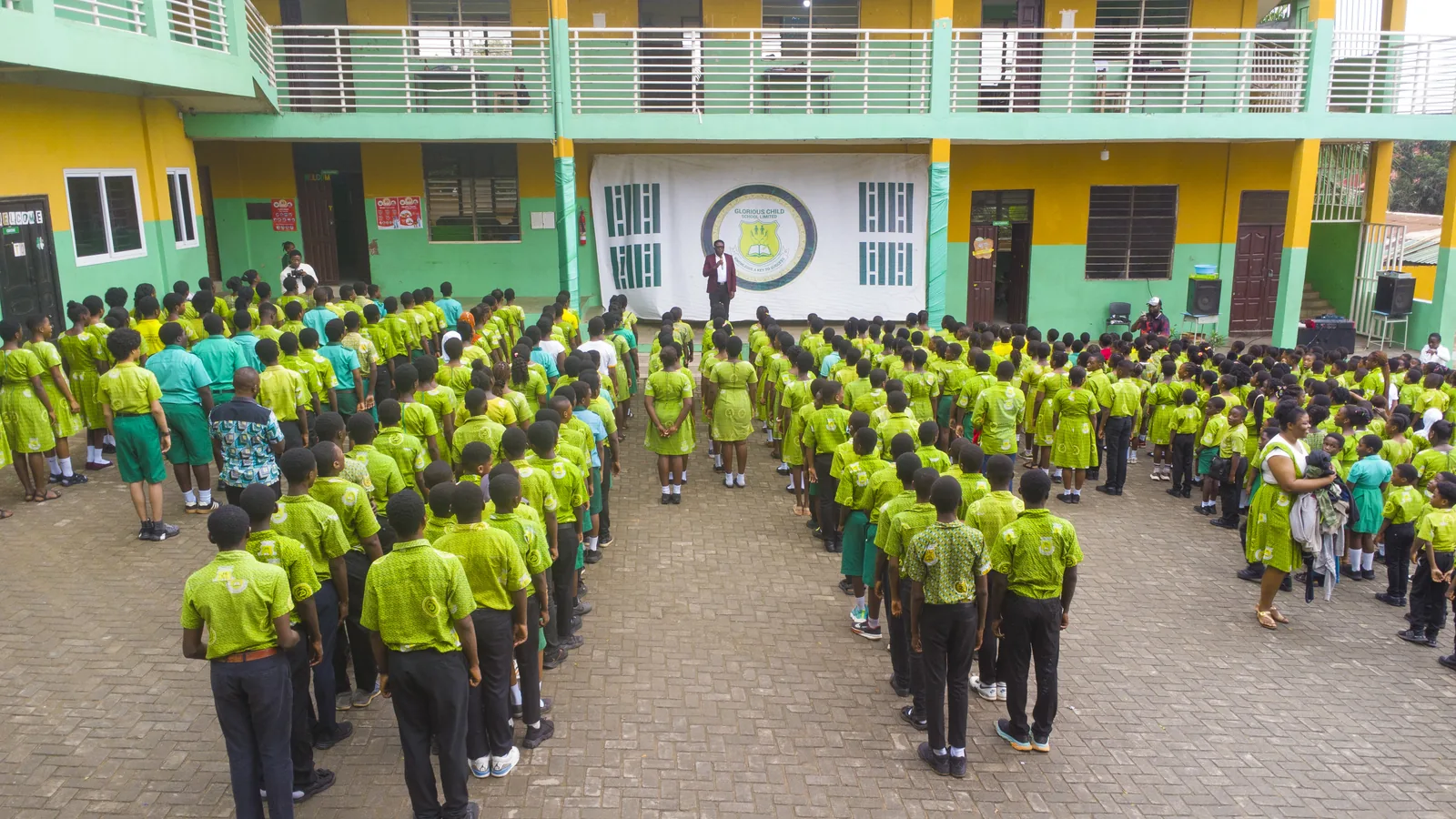 The full student body gathered for morning assembly at Glorious Child School